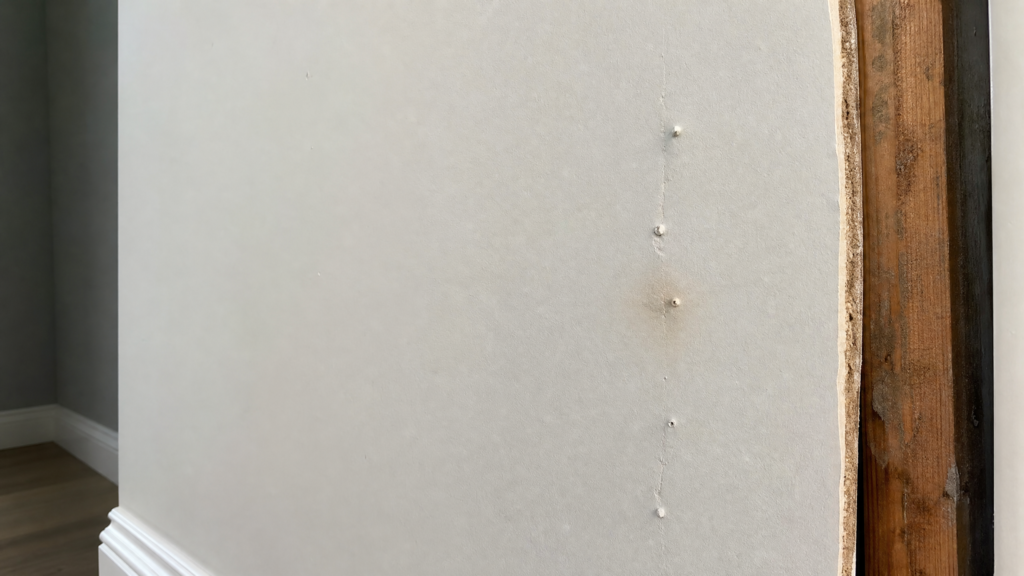 how to repair nail pops in drywall